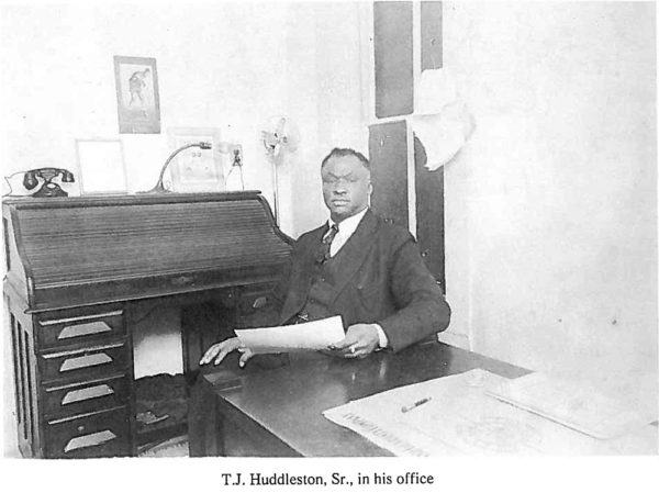 T J Huddleston Sr in his office WEB